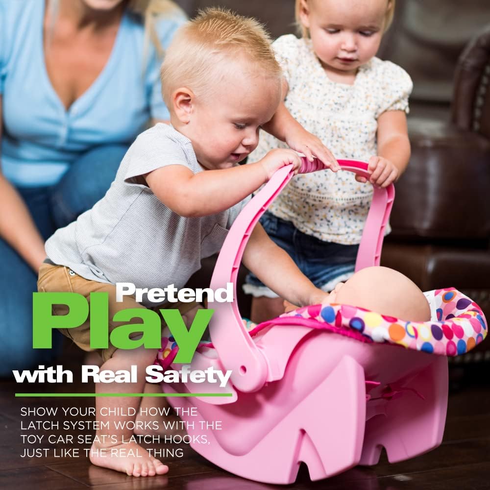 Joovy Toy Car Seat Baby Doll Carrier Featuring Crash-Tested Latch System for Safety, Machine-Washable Cover for Easy Cleaning, and Five-Point Harness - Fits Dolls 12” to 22”, Pink